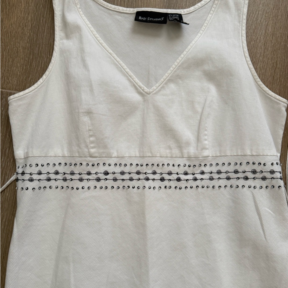 Elegant White Cotton Sleeveless Top With bead detailing and strings in the back